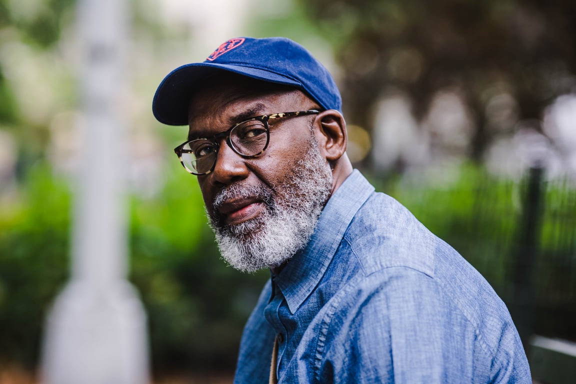 Portrait of Elderly Man Wearing Eyeglasses and Blue Cap